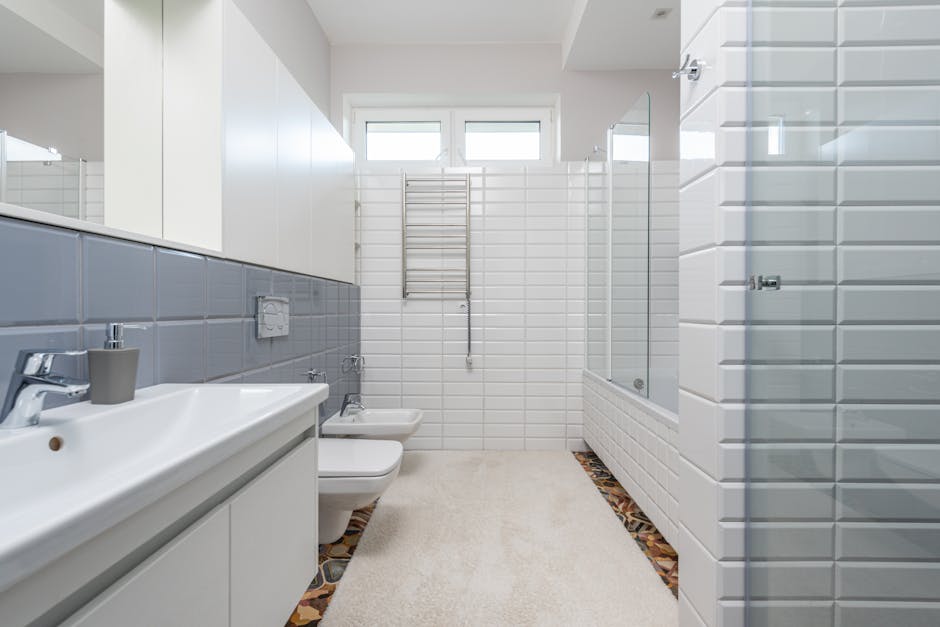 Modern bathroom with modern fixture in light colors