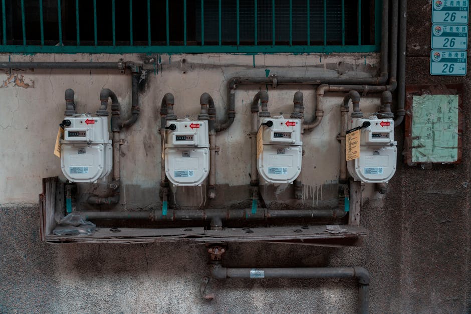 Pipes Connecting to Gas Meters on Wall