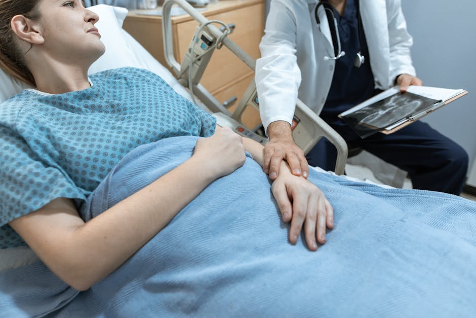 Doctor Touching the Arm of a Patient