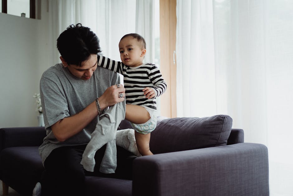 Father Dressing His Son