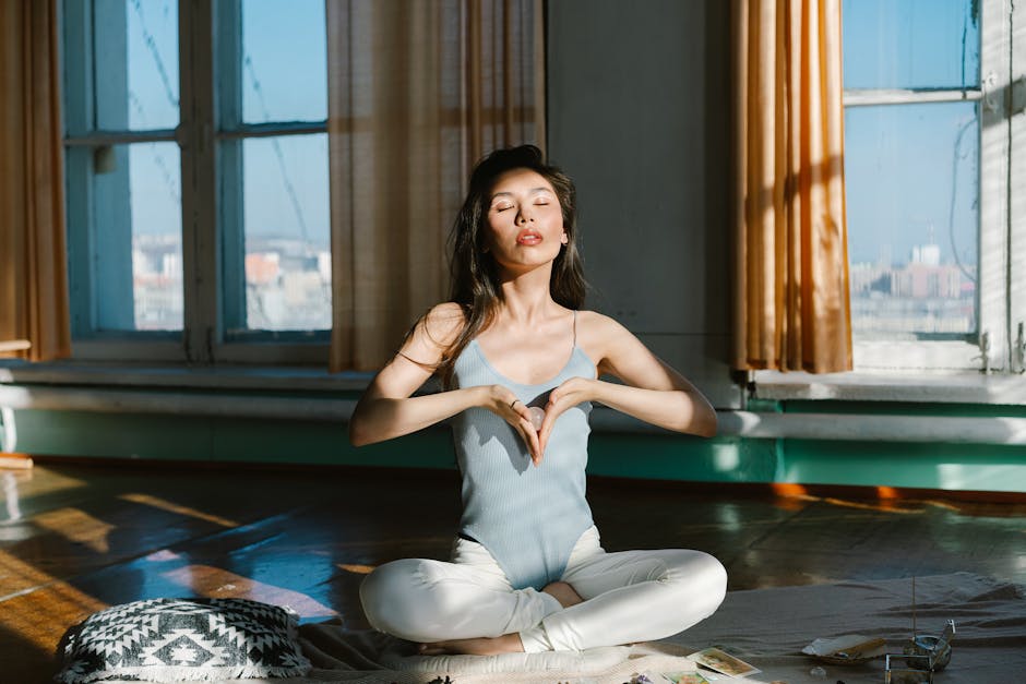 Asian woman with stone practicing meditation