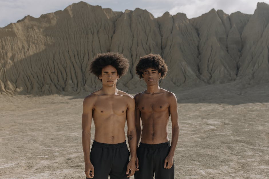 Two Young Men Shirtless in the Desert