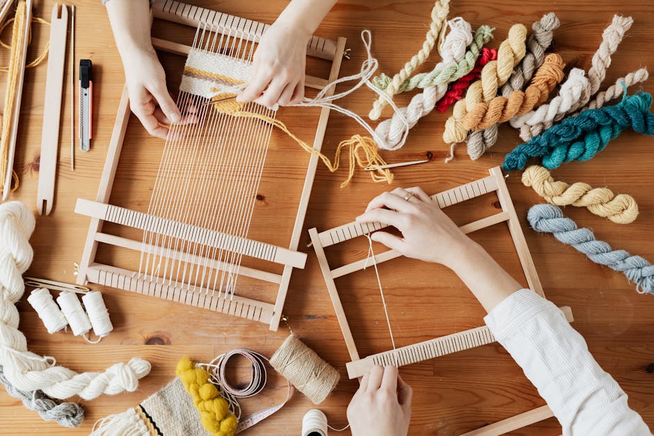 Top View Photo of Two Person’s Hands Weaving