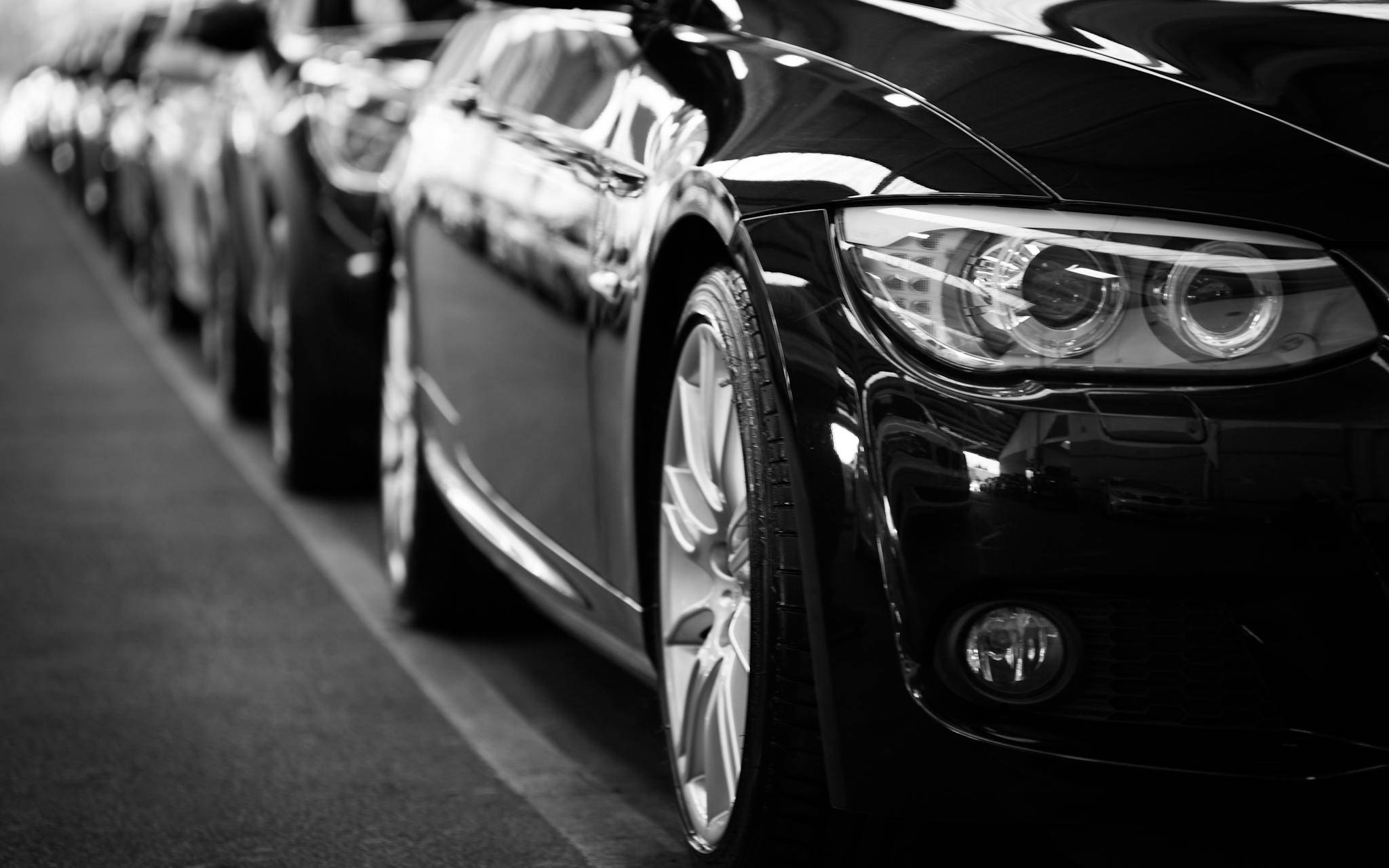 Low-Angle Shot of a Person Standing next to a Car