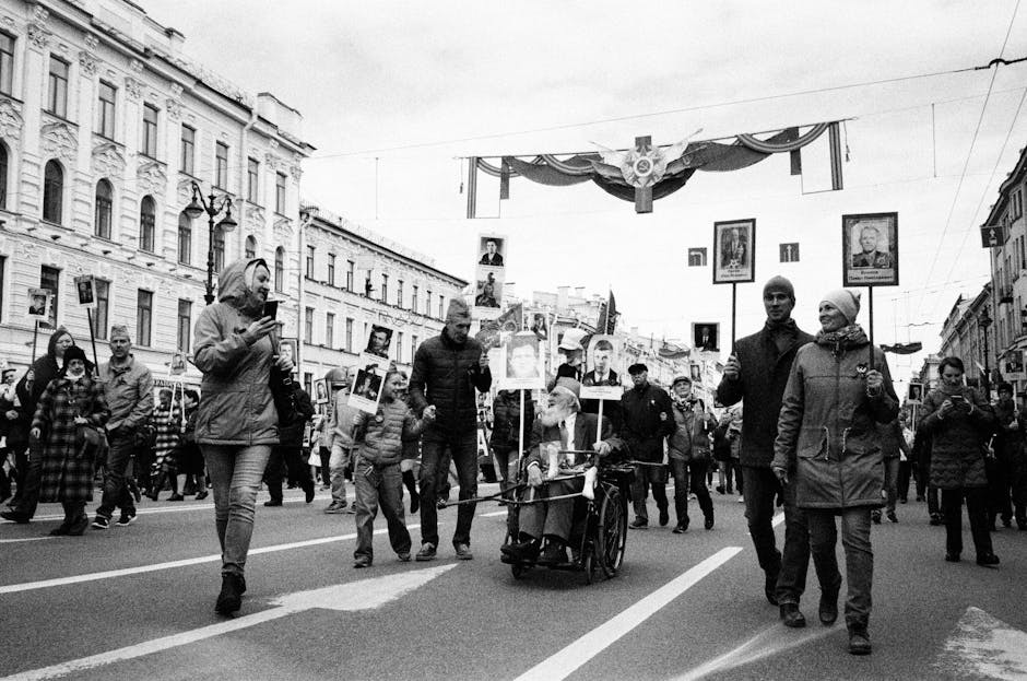 Black and White Photo of Parade on Street