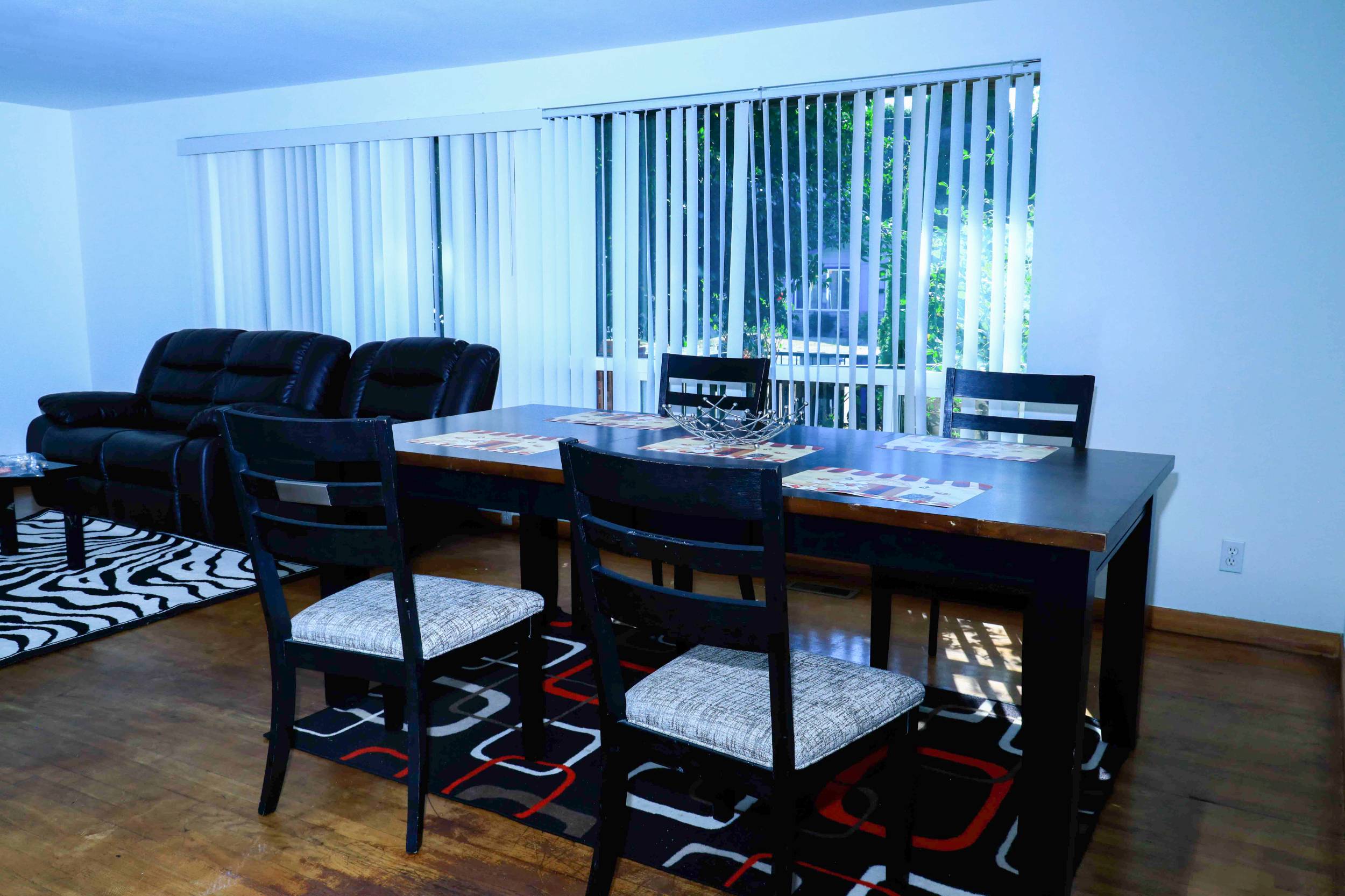 Spacious living room with dining area and kitchen