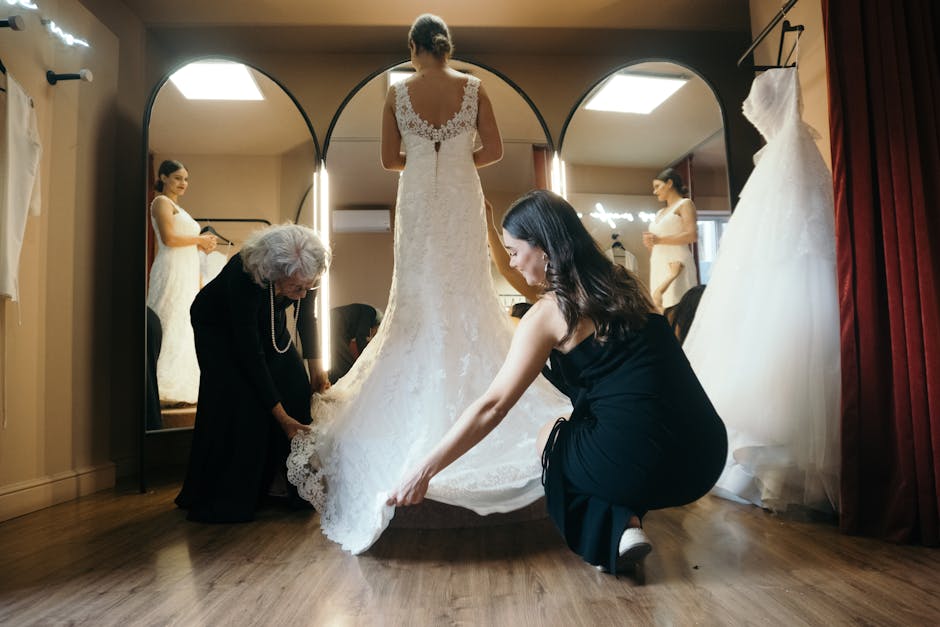 A Bride Fitting Her Wedding Dress in a Fitting Room