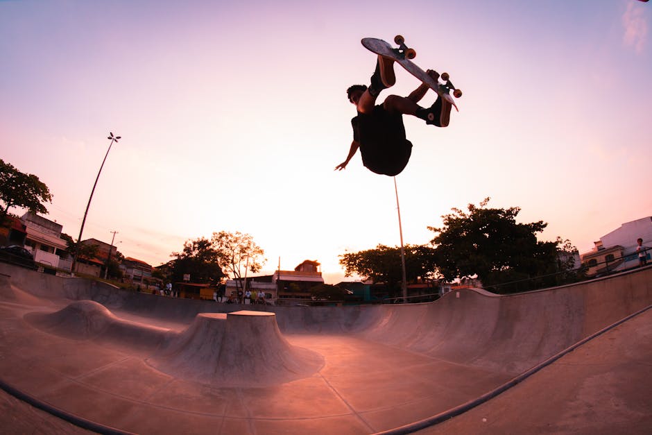 Time Lapse Photography of Man Doing Skateboard Trick