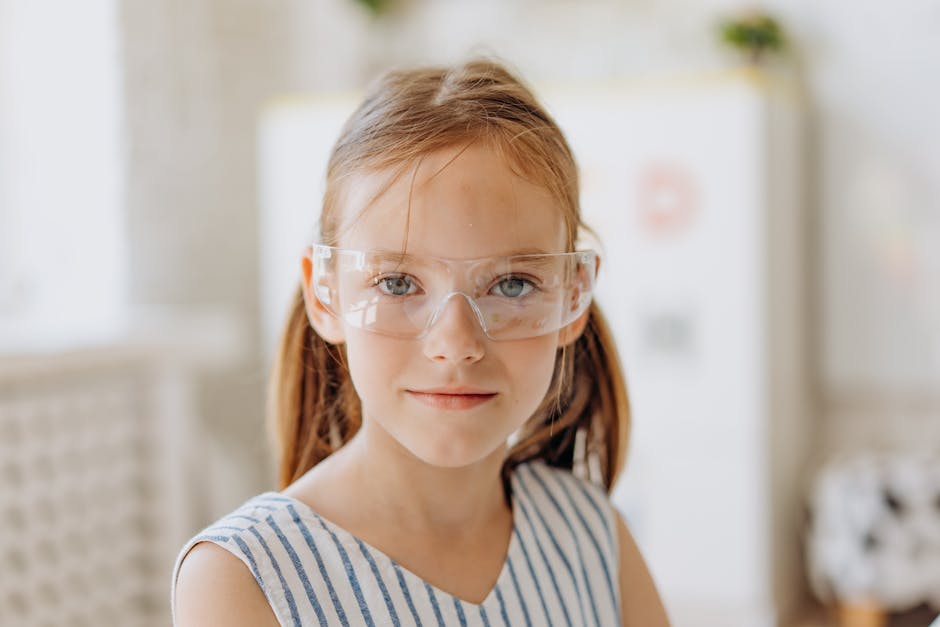 Portrait of a Young Girl Wearing Safety Glasses