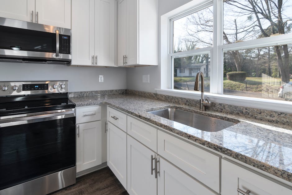 White Wooden Kitchen Cabinet With Stainless Steel Sink