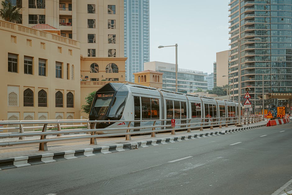 Modern public transport among high buildings