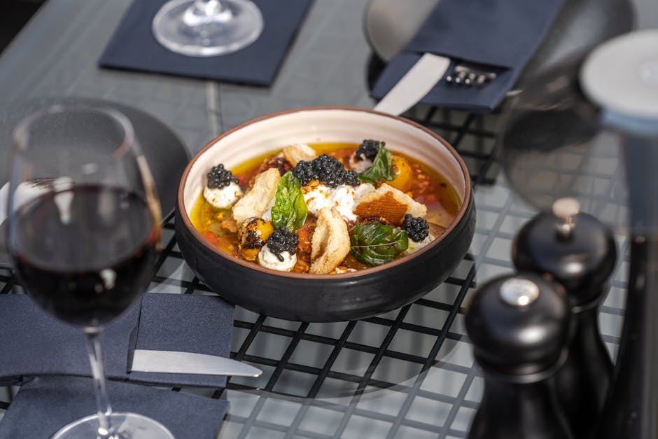 A Ceramic Bowl with Food on the Table