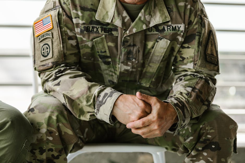 Photo of Person Wearing Military Uniform