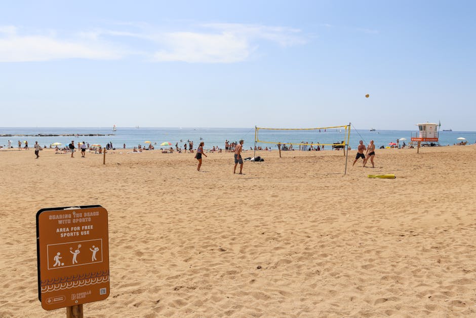 Tourists Playing Beach Volleyball