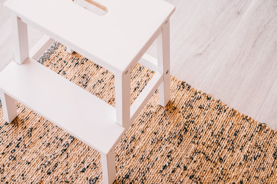 White Wooden Step Ladder on Brown Carpet