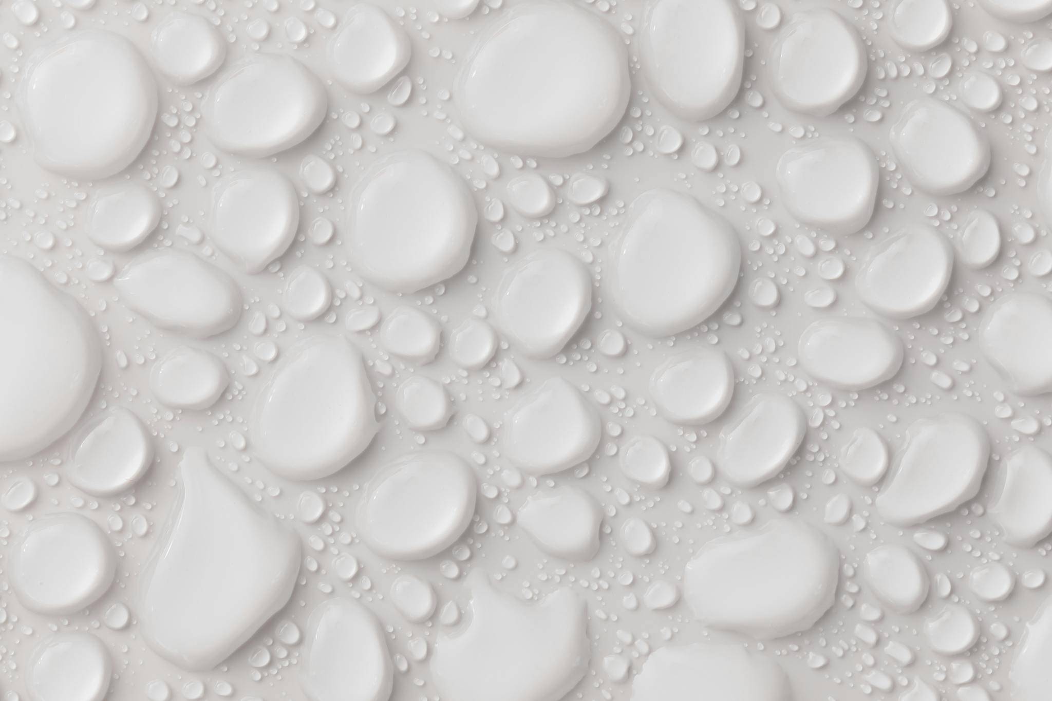 Abstract background with white glassy drops