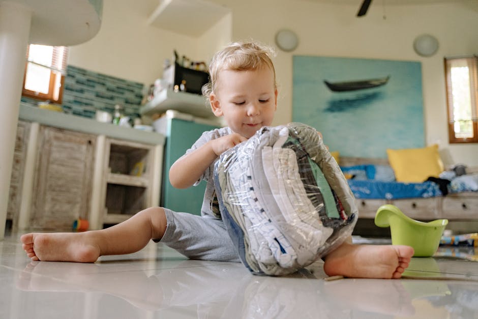 Toddler Playing with Clothes Plastic Bag