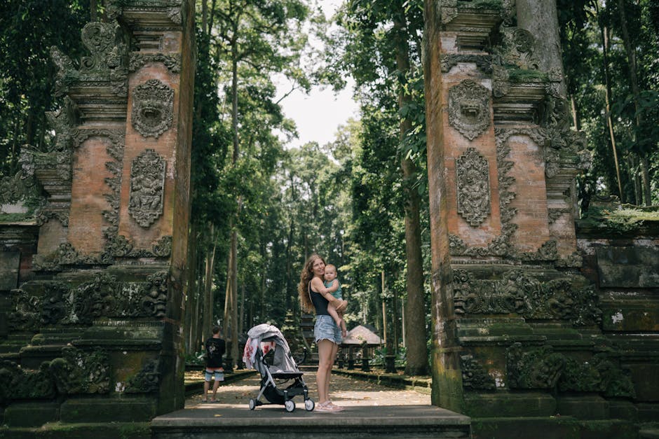 A Woman Posing while Carrying his Child