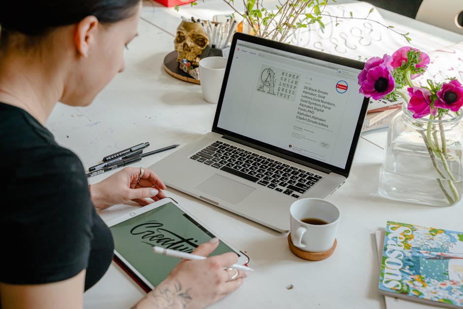 Woman Working with Laptop in Office