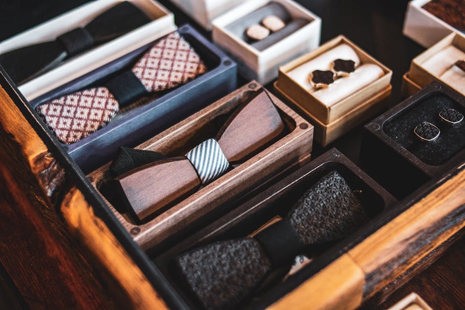 Close-up of a Drawer with Elegant Bow Ties and Cufflinks