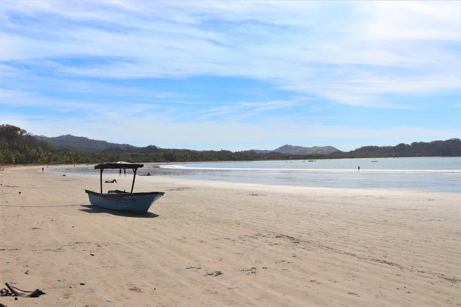 Boat Docked on a Sandy Shore in the Beach