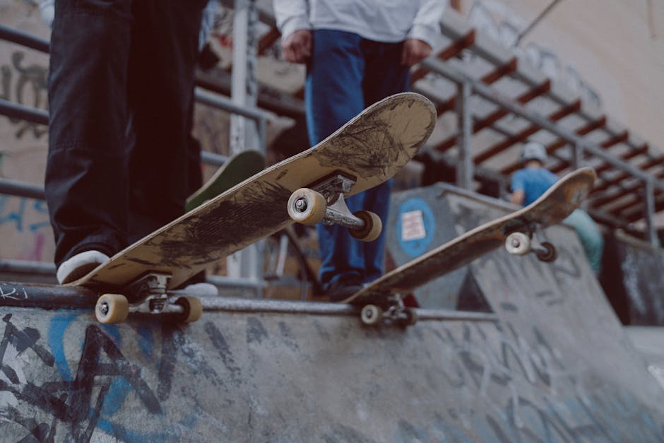 People with Skateboards Standing on the Ramp