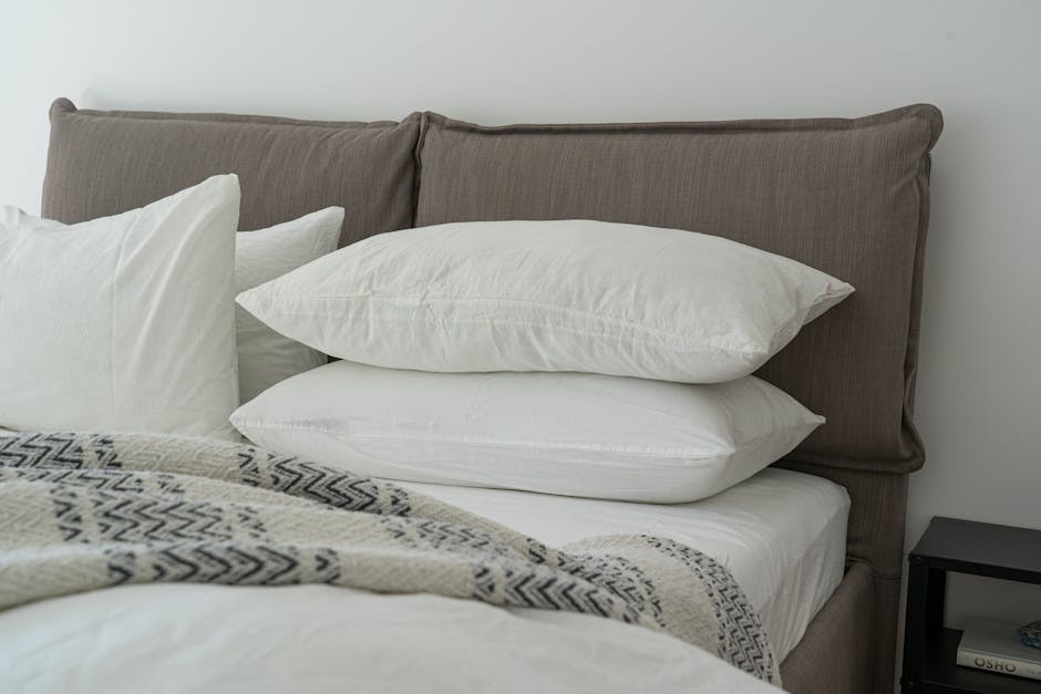 White Pillows on a Bed