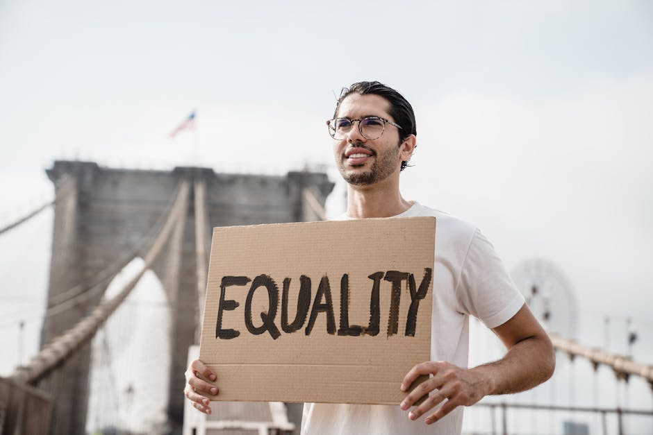 Man holding a Cardboard Placard