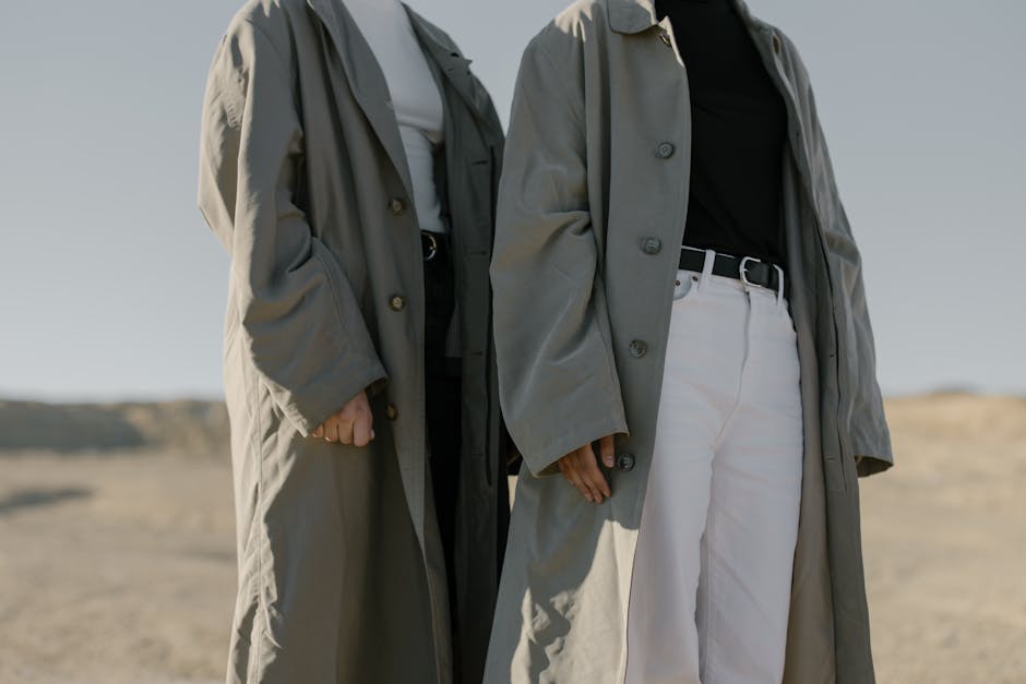 Man in Black Jacket and White Pants