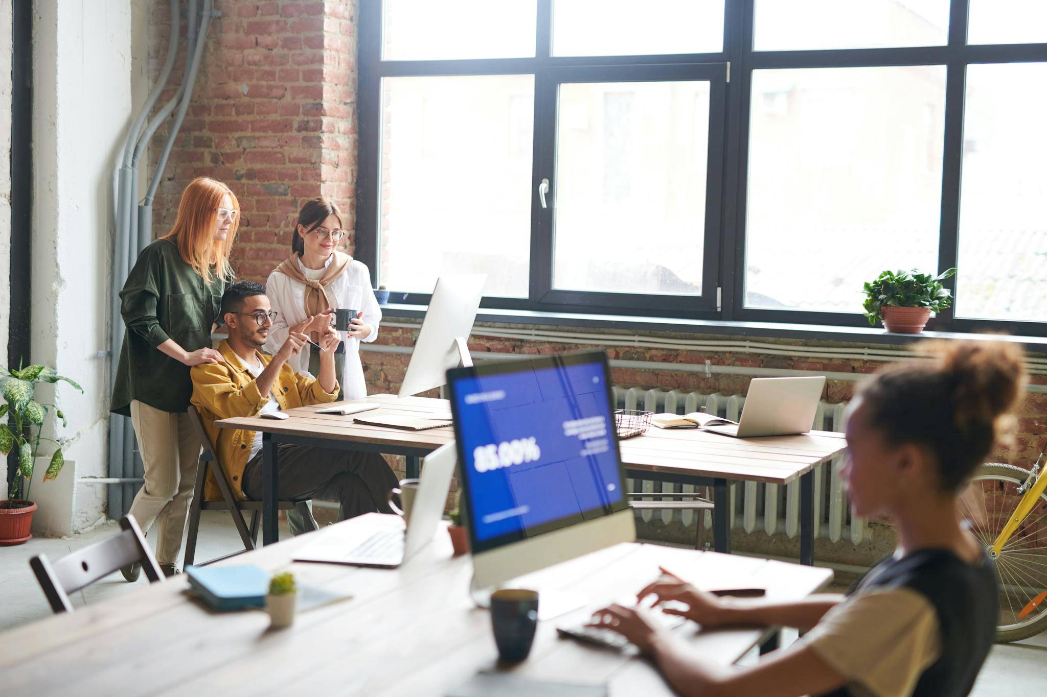 People in the Office Discussing a Project