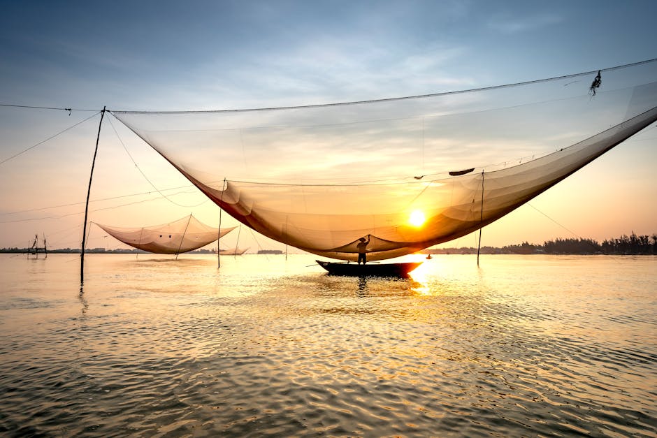 Anonymous fisherman casting fishing nets