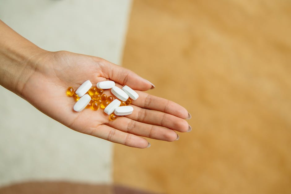 Pills on a Person’s Hand