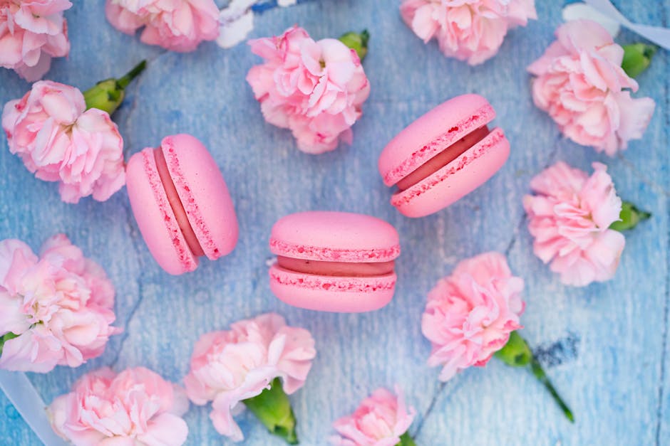 Composition of pink macaroons and carnations