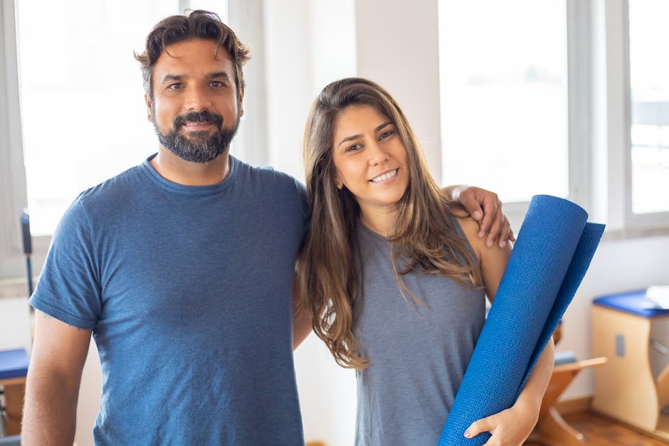 A Man and a Woman Exercising in Their Active Wear