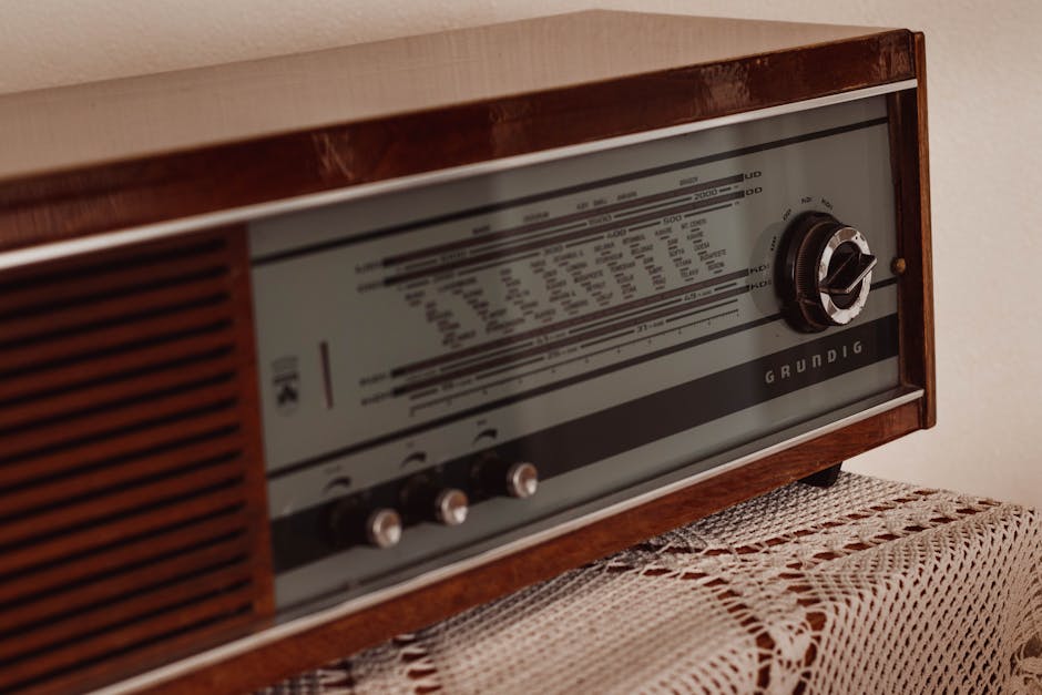 Retro radio on table in house