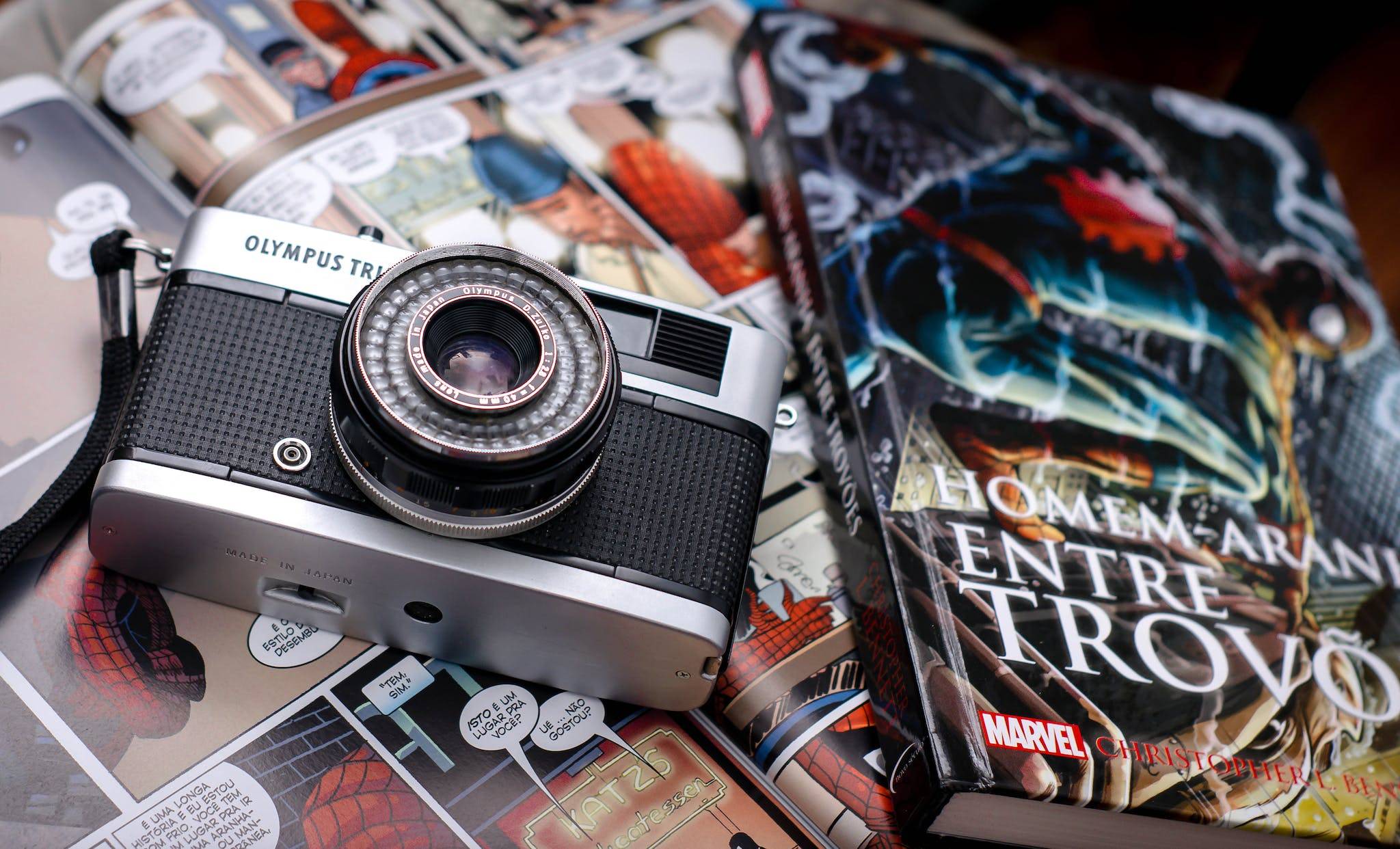 Comic books and photo camera