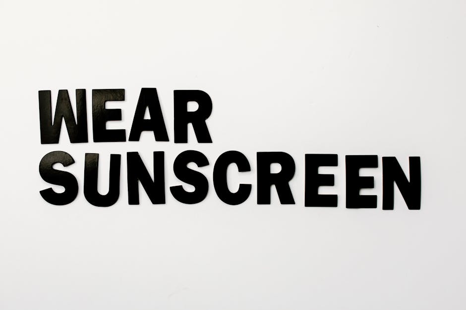 Black Text Saying “Wear Sunscreen” on White Background