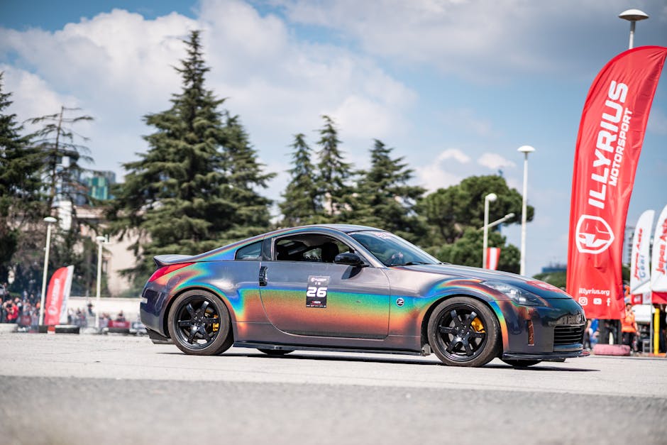 A Car with a Holographic Car Wrap at a Car Show