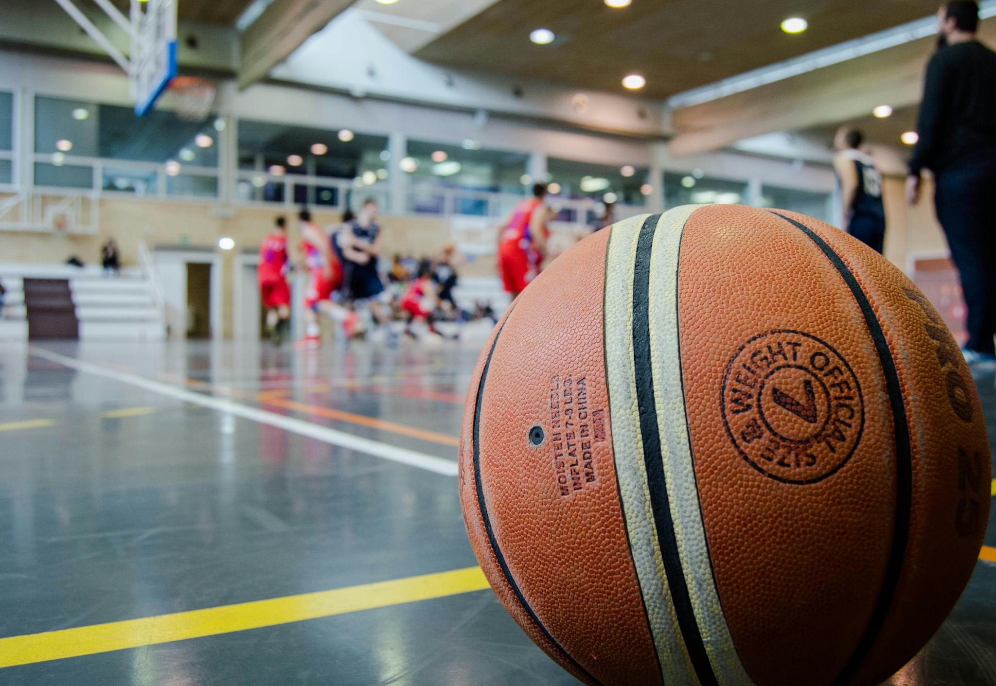 A Basketball Team in a Huddle