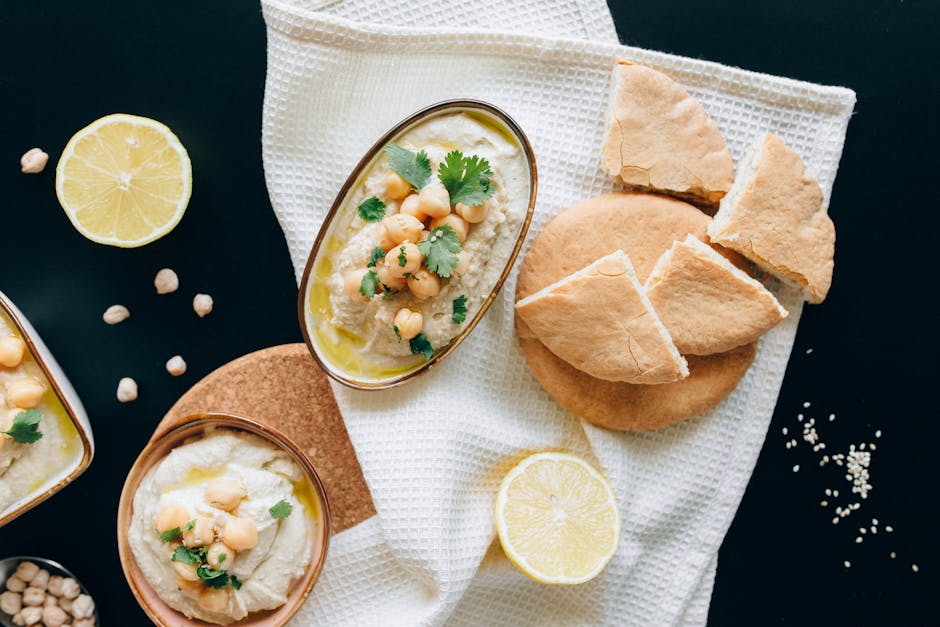 Overhead Shot of Bread Near Hummus Dip