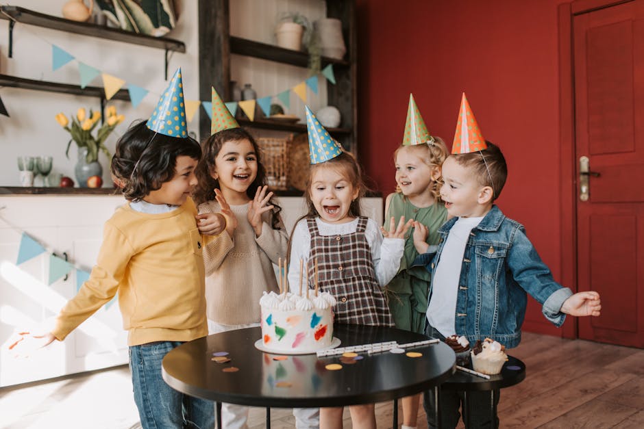 Photo of a Group of Kids Celebrating a Birthday Party