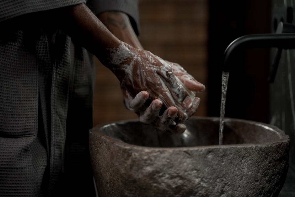 Person Washing Hands