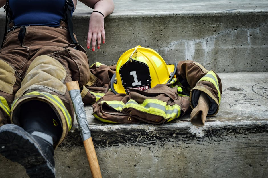 Yellow Hard Hat on Brown and Yellow Fireman’s Suit