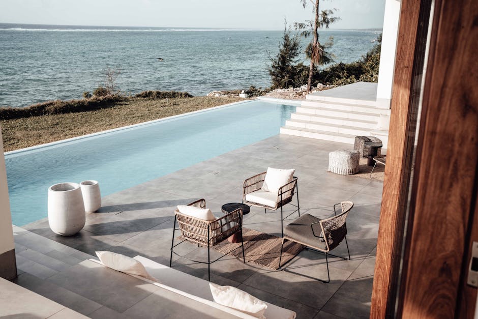 Patio of a House with a Swimming Pool on Seashore