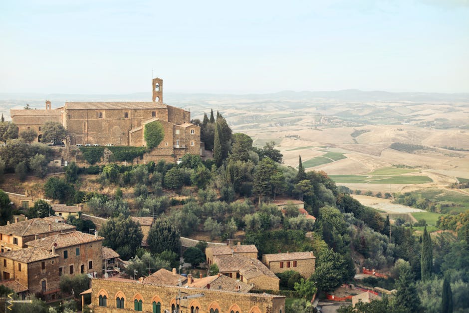 Old town with green trees on hill