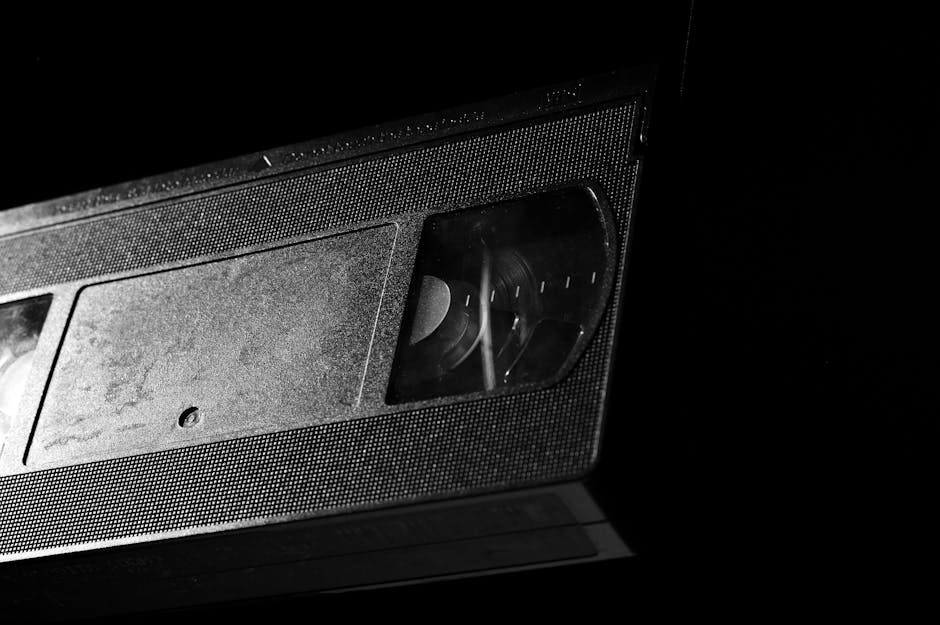 Grayscale Photography Of Vhs Tape