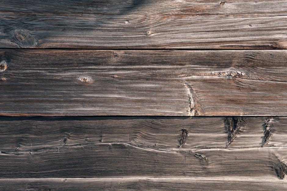 From above texture of aged shabby wooden table made of natural lumber panels as abstract background