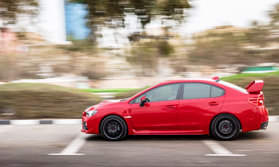 Red Subaru WRX Speeding Through Parking Spaces