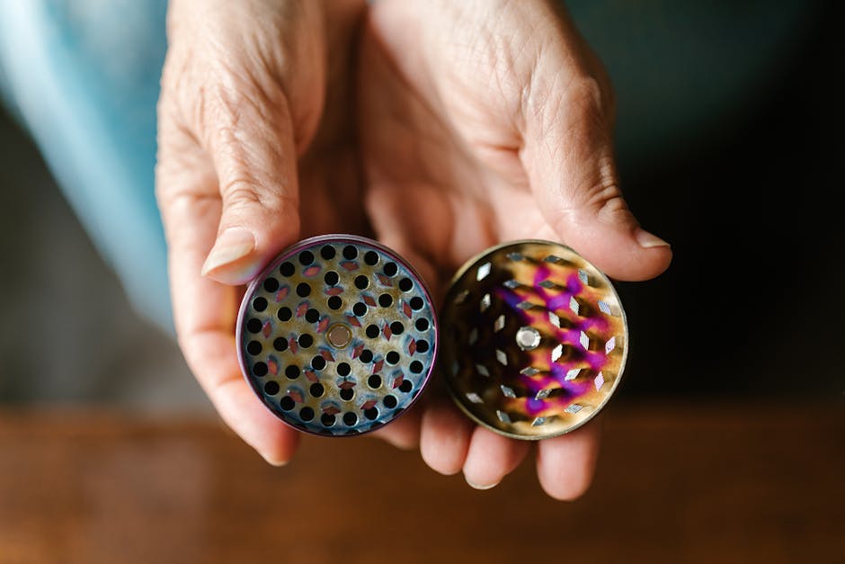 A Person Holding a Weed Grinder