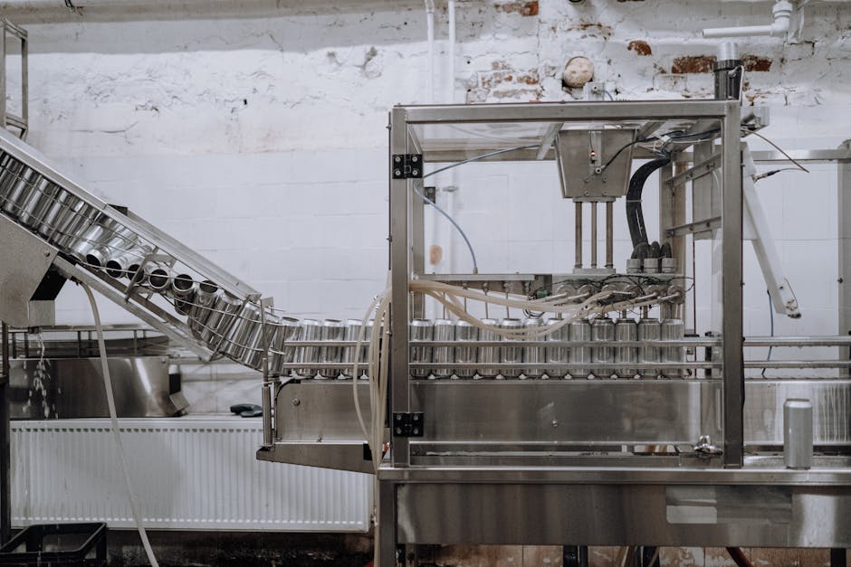 Aluminum Cans Passing Through the Assembly Line